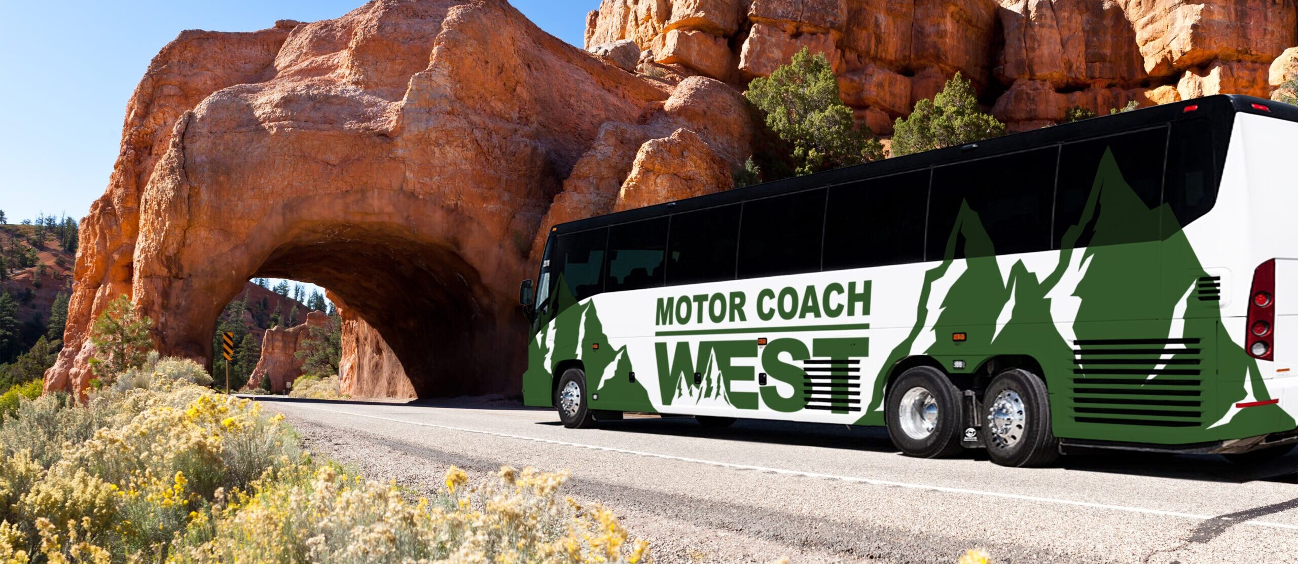 Green Motor Coach West bus entering a rock tunnel.