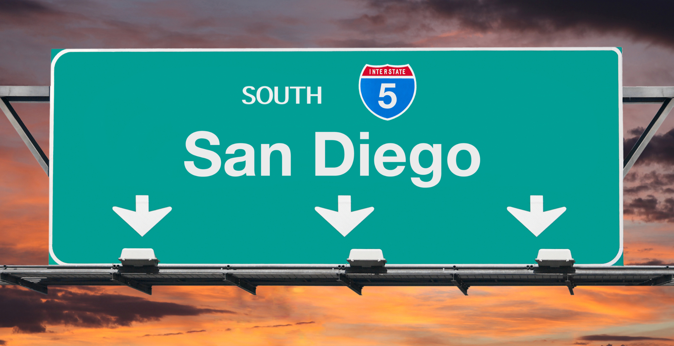 San Diego Interstate sign in front of sunset