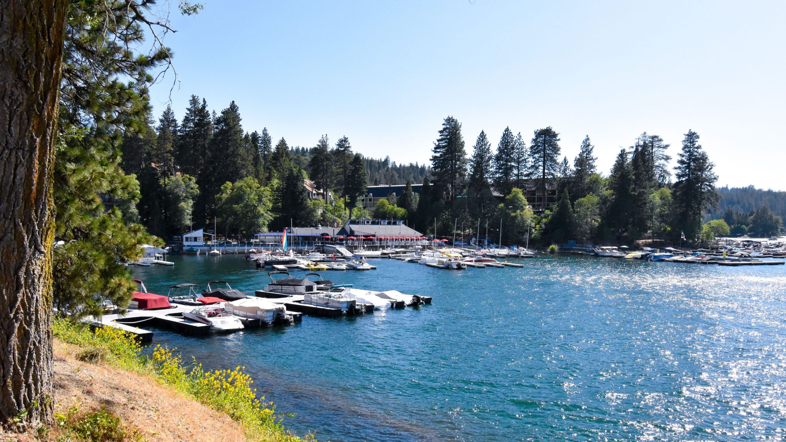 pier with moored boats on lake arrowhead